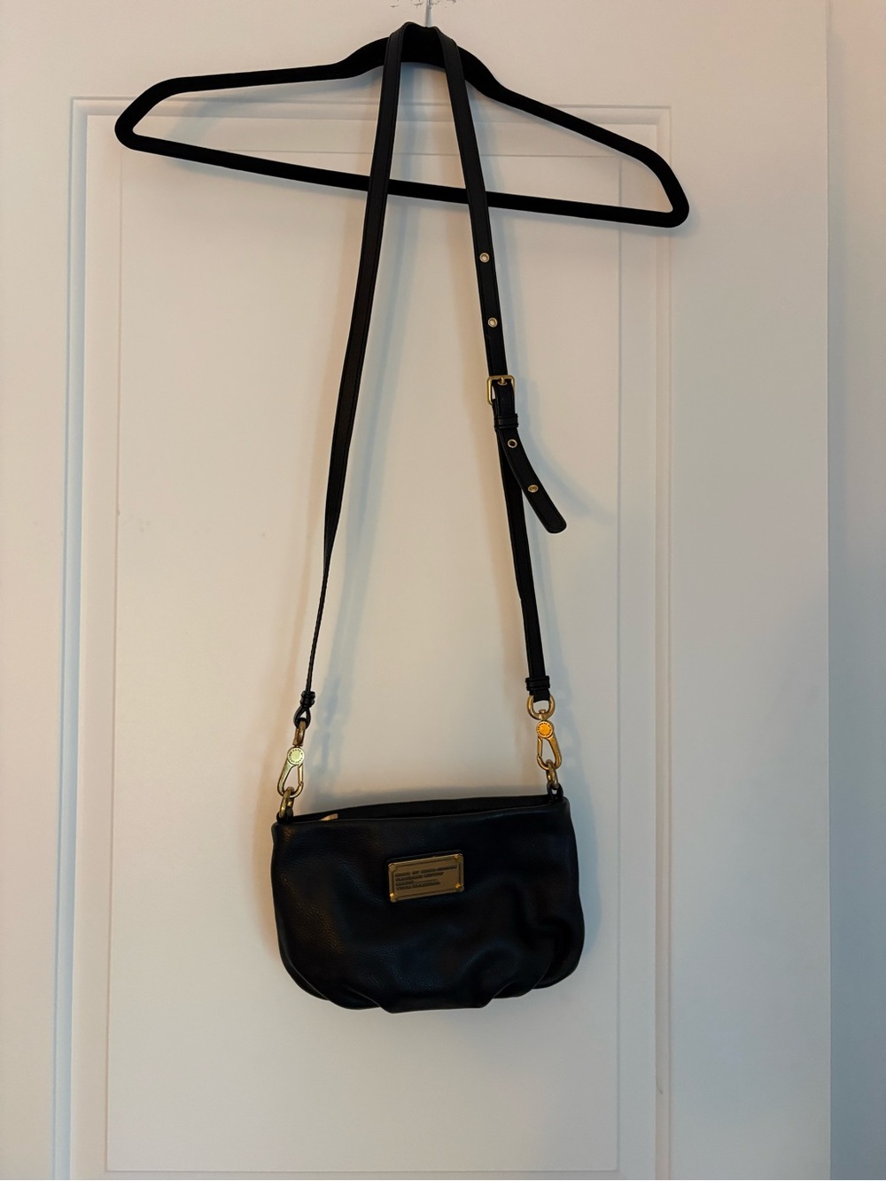 Marc Jacob’s Black Leather Crossbody Bag with Gold Hardware